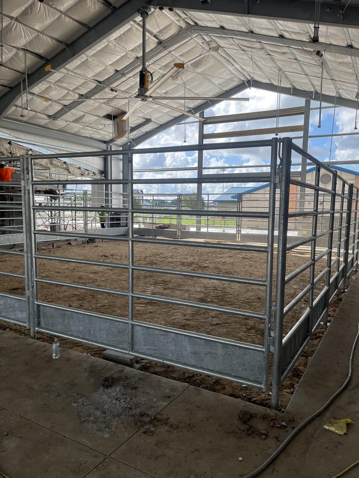 Galvanized holding pens beside the new Dickinson ISD steel barn